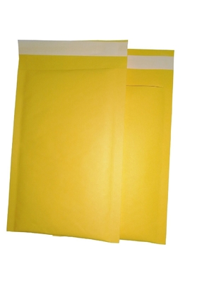 Сильные слипчивые желтые отправители Kraft пузыря завертывают проложенные грузя конверты в бумагу